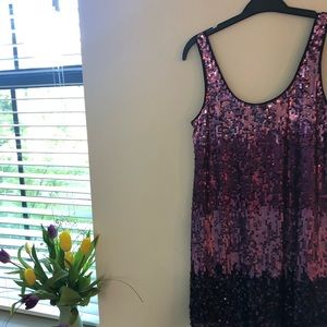 Purple sparkly dress.